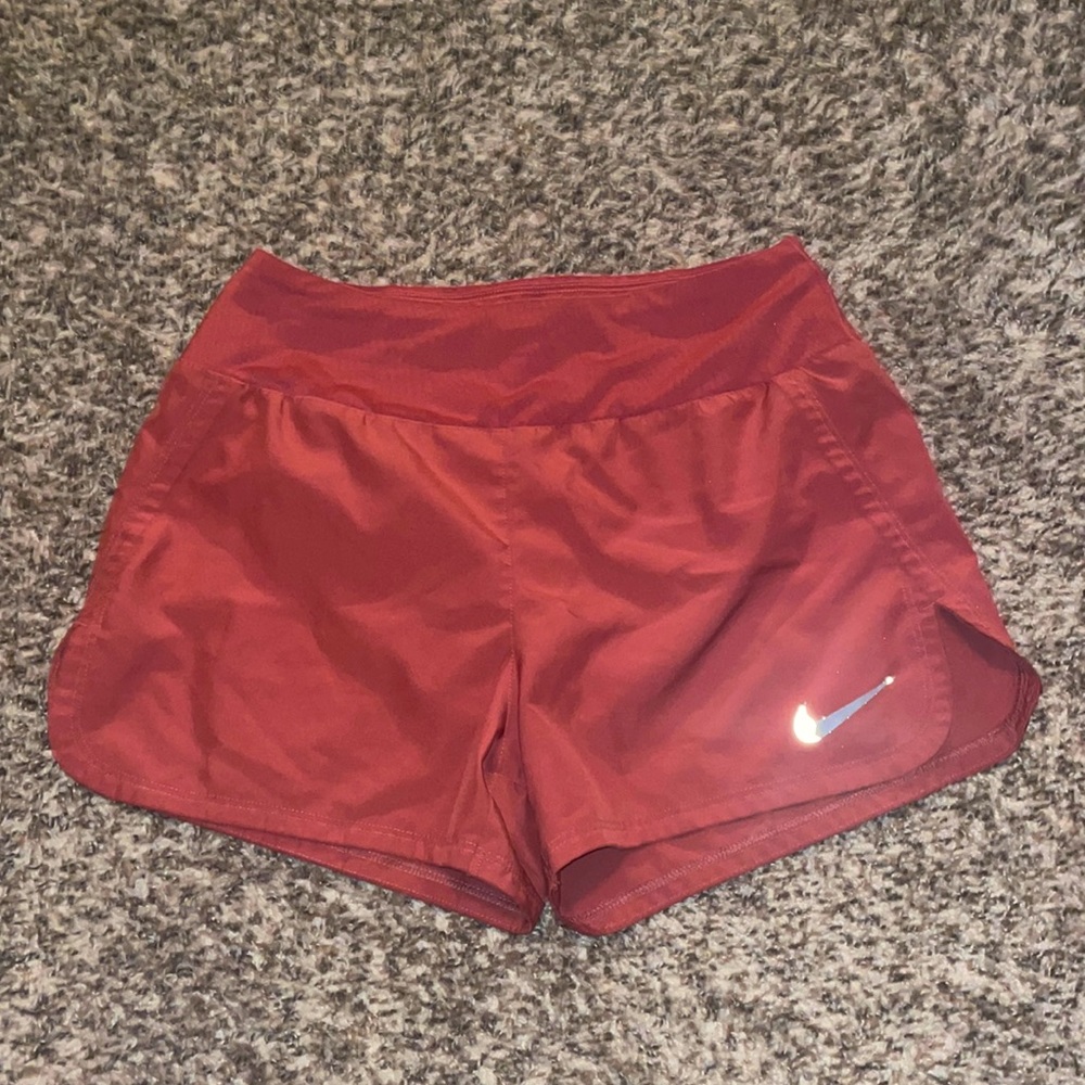 Women’s maroon nike running shorts
